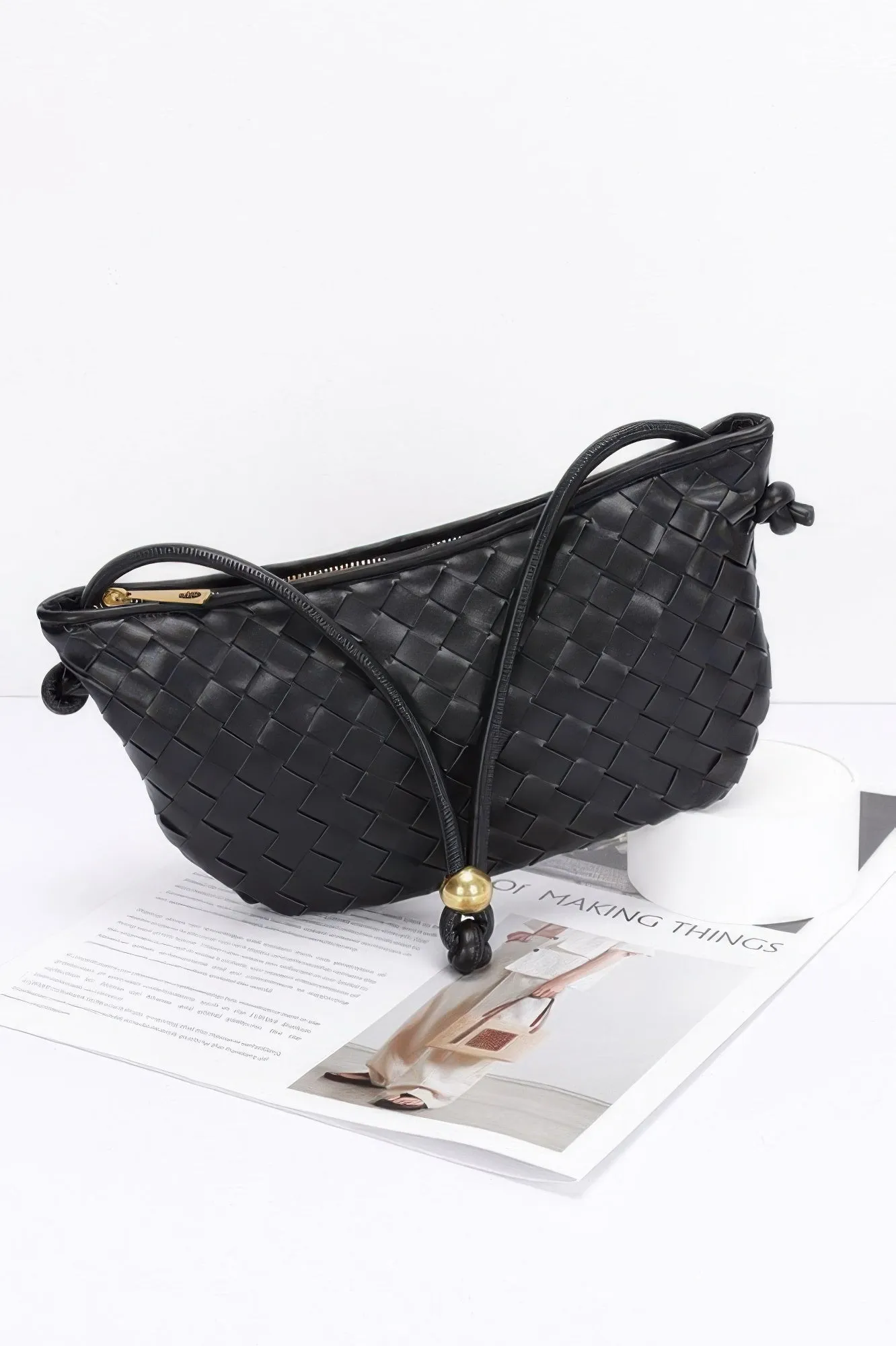 Faux Leather Braided Wrist And Shoulder Bag sold by Unique Kulture