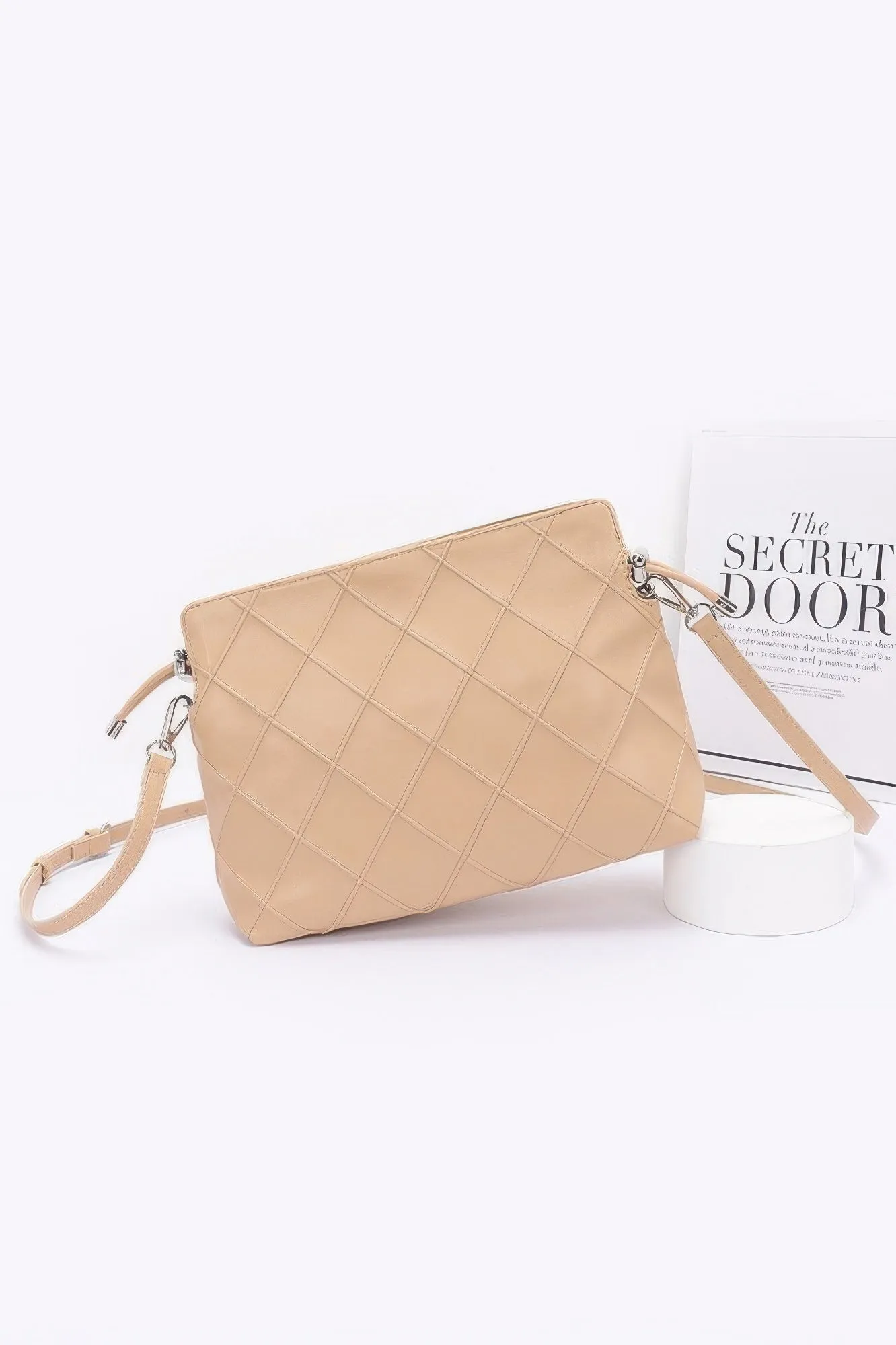 Quilted Faux Leather Bucket Crossbody Bag sold by Unique Kulture product image thumbnail 4