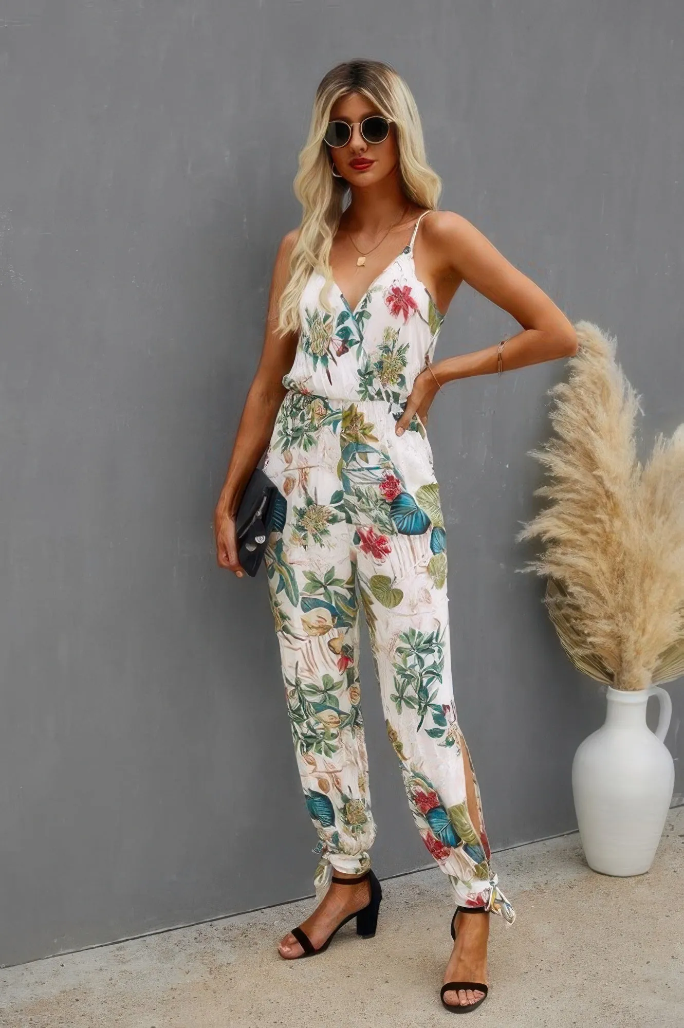 Sleeveless Floral Print Knot Side Cami Jumpsuit sold by Unique Kulture