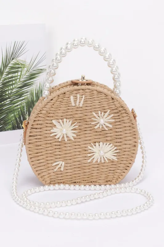 Faux Straw Handmade Clutch W/pearl Handle sold by Unique Kulture