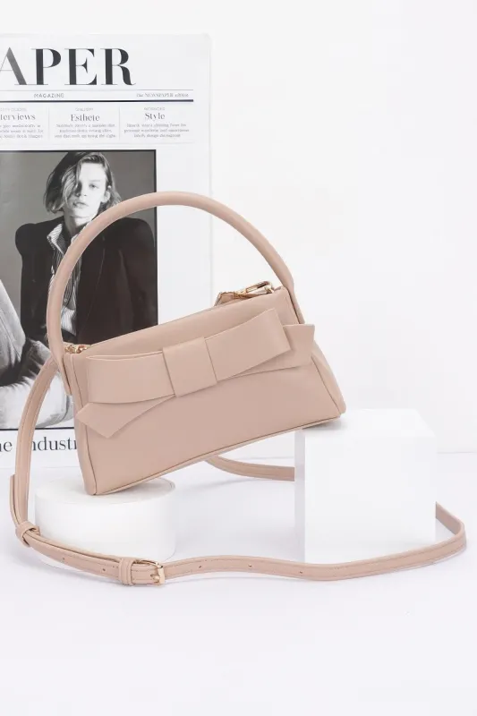 Faux Leather Ribbon Top Handle Clutch sold by Unique Kulture