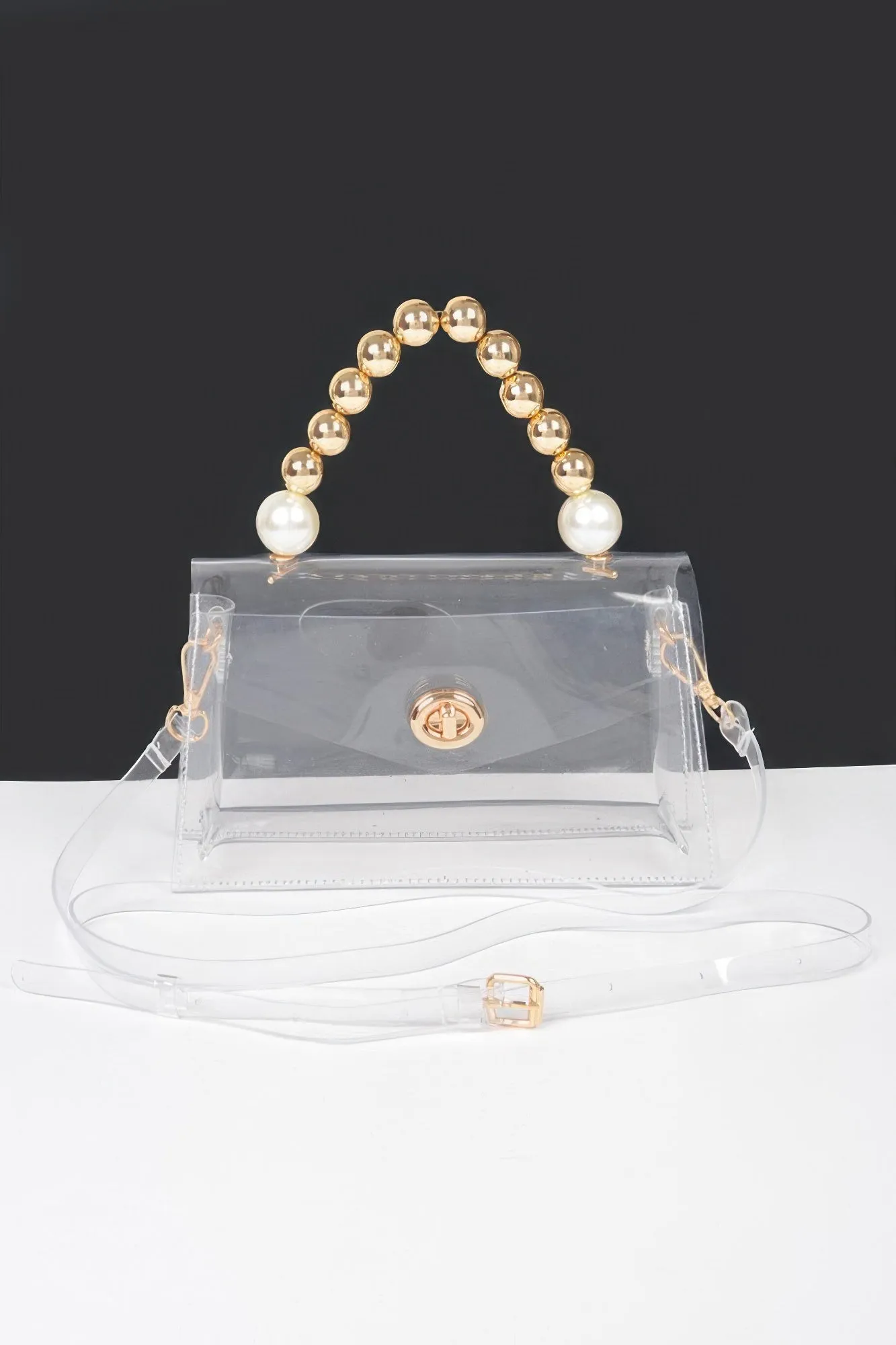 Transparent Ccb Handle Flap Clutch sold by Unique Kulture