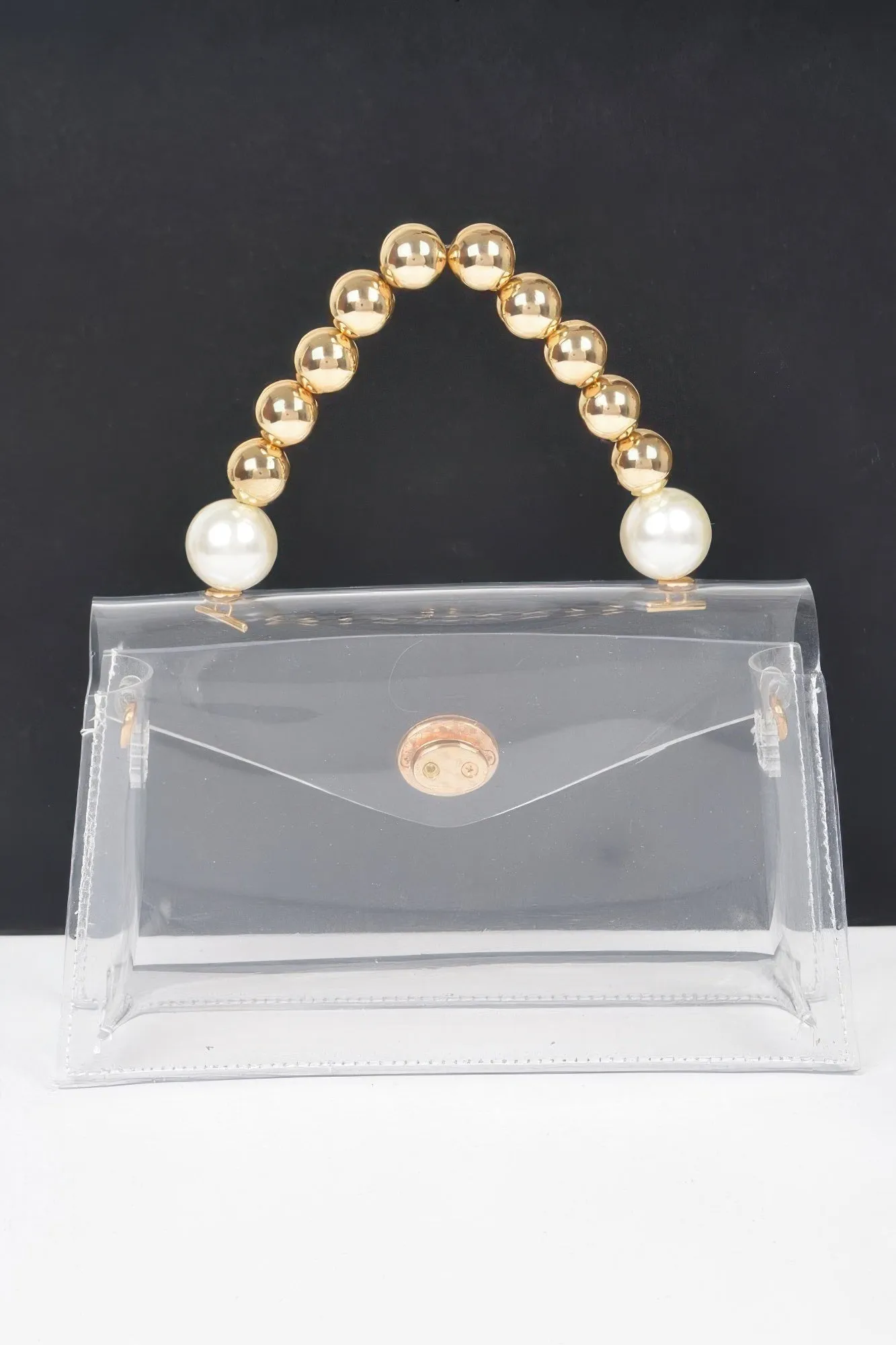 Transparent Ccb Handle Flap Clutch sold by Unique Kulture product image thumbnail 4