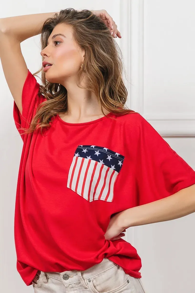 BiBi French Terry With Front Pocket Dolman Sleeves Top sold by Unique Kulture