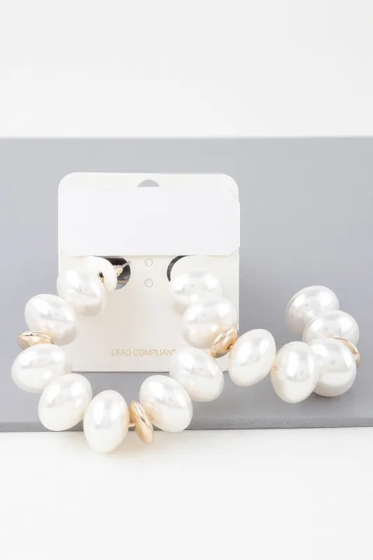 Multi Oval Pearl Hoop Earrings sold by Unique Kulture