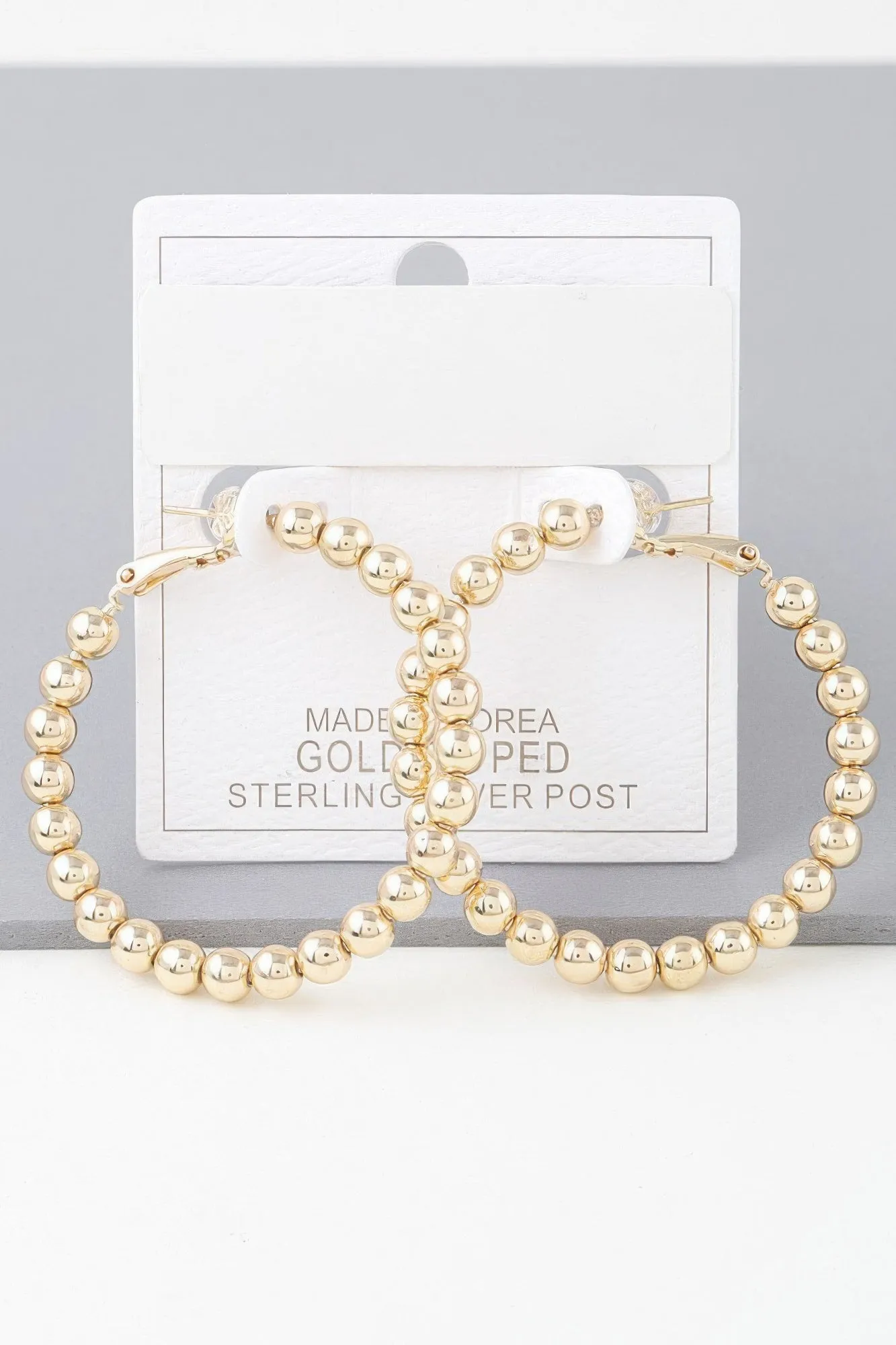 Shiny Beaded Hoop Earrings sold by Unique Kulture