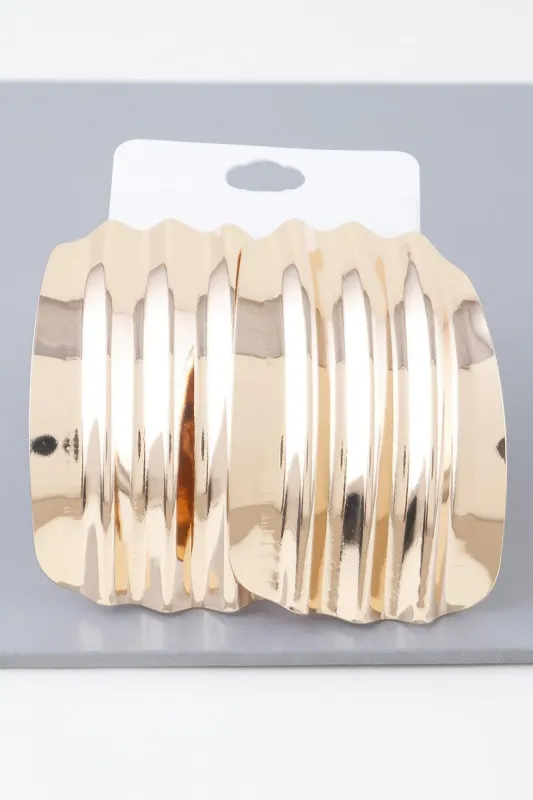 Shiny Ribbed Curve Earrings sold by Unique Kulture