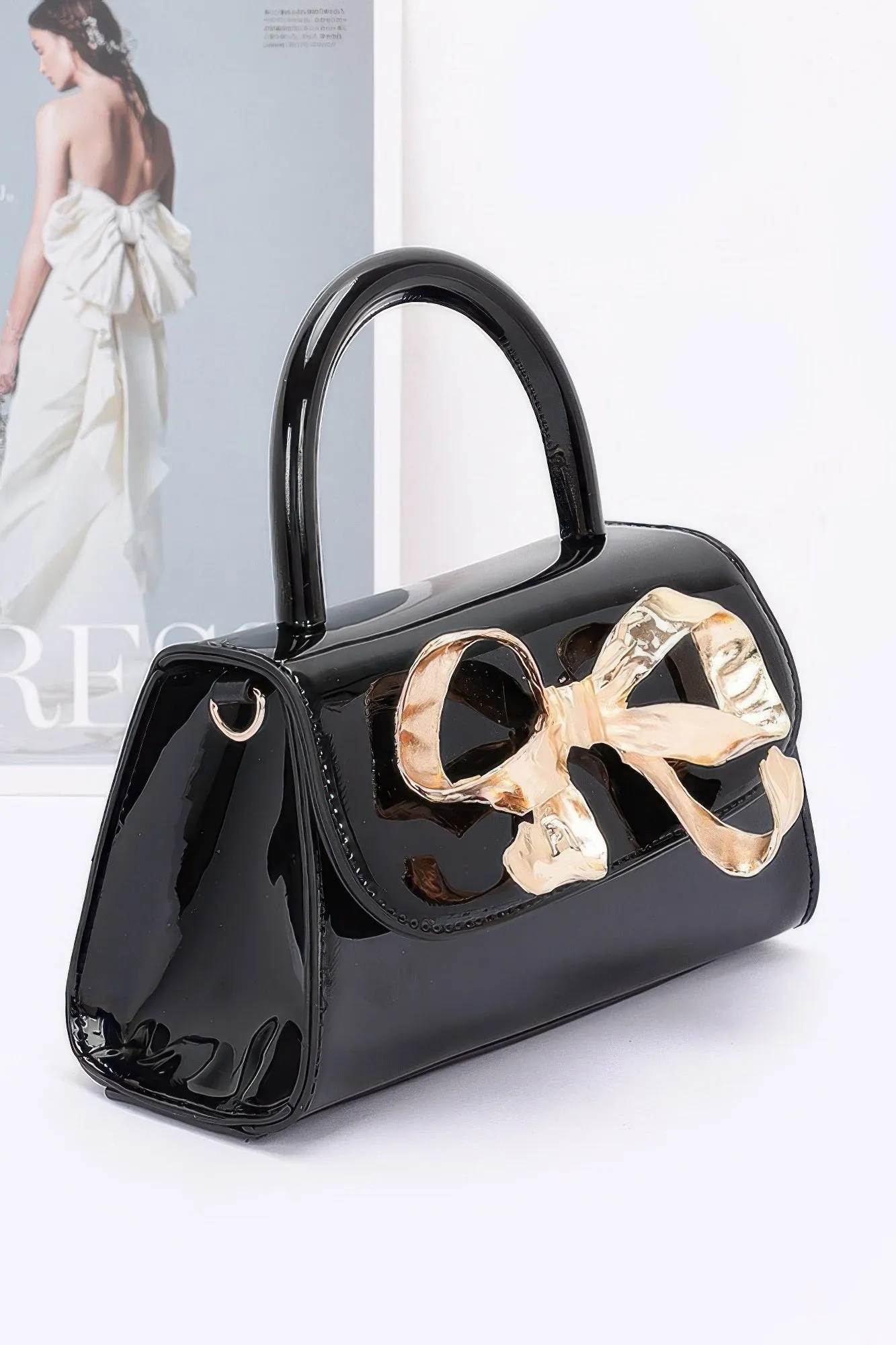 Faux Leather Metal Ribbon Top Handle Bag sold by Unique Kulture product image thumbnail 2