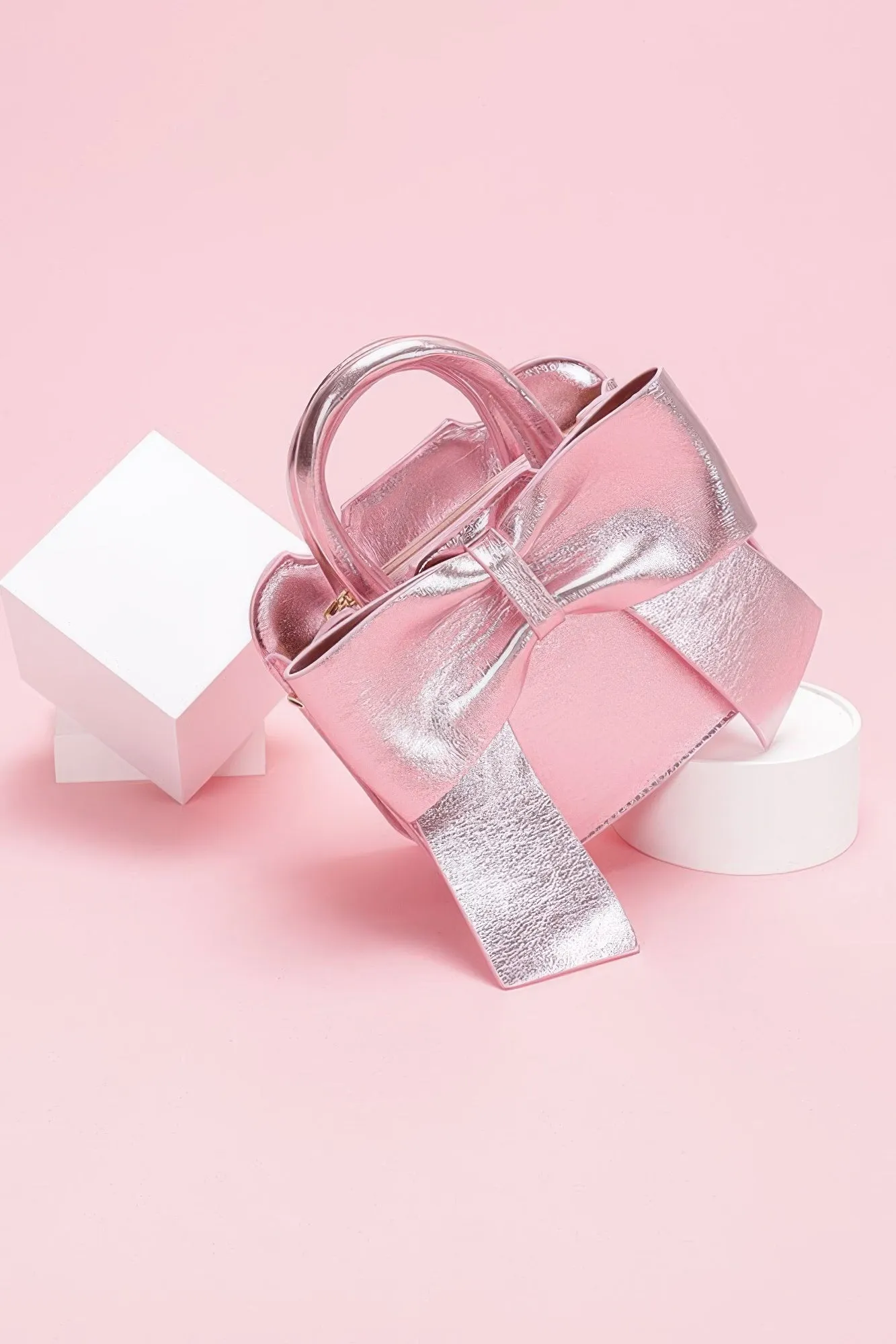 Metallic Bow Front Top Handle Clutch sold by Unique Kulture product image thumbnail 3