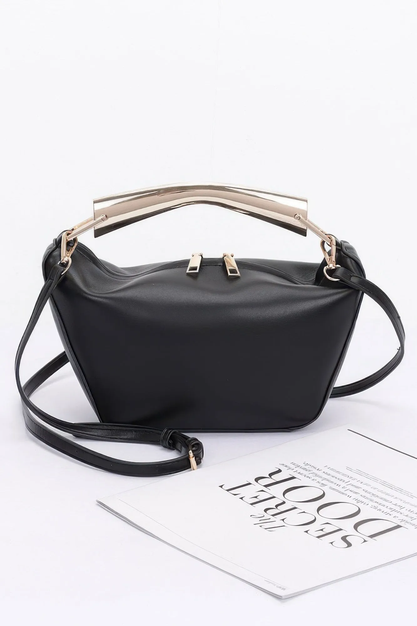 Faux Leather Metal Handle Bag sold by Unique Kulture