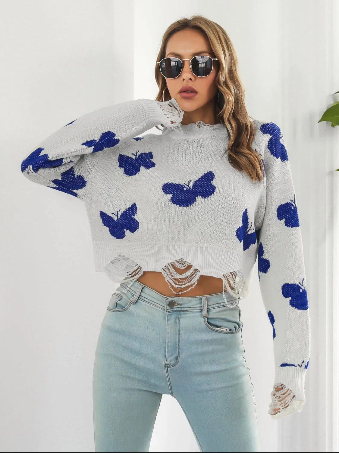 Distressed Butterfly Cropped Sweater sold by Unique Kulture