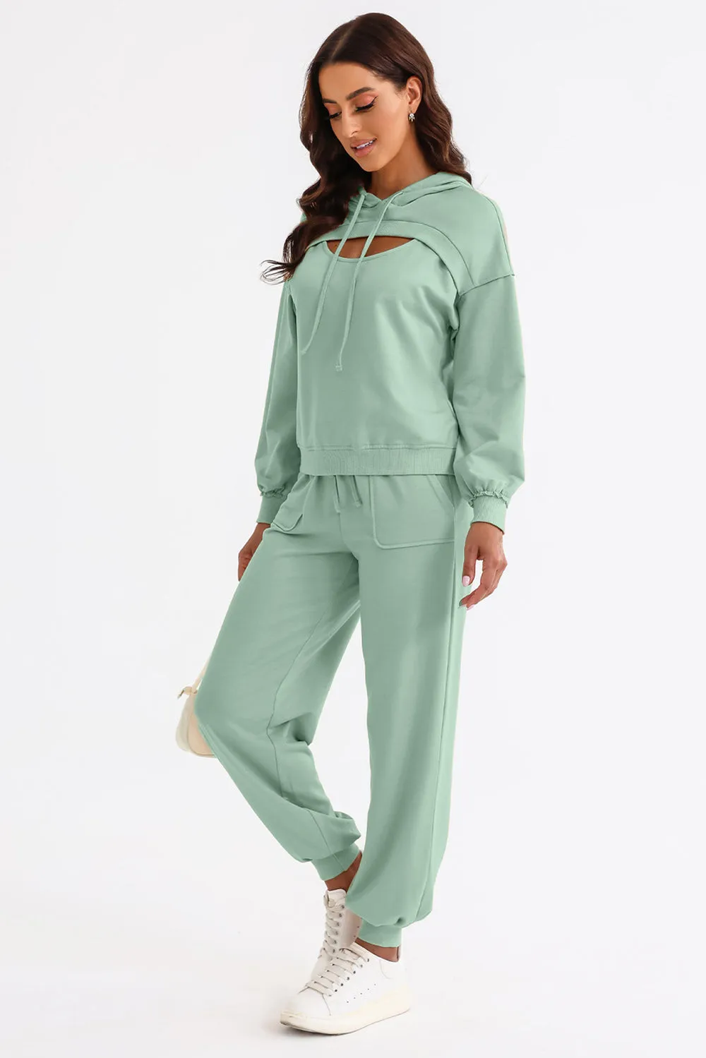 Cutout Drawstring Hoodie and Joggers Active Set sold by Unique Kulture