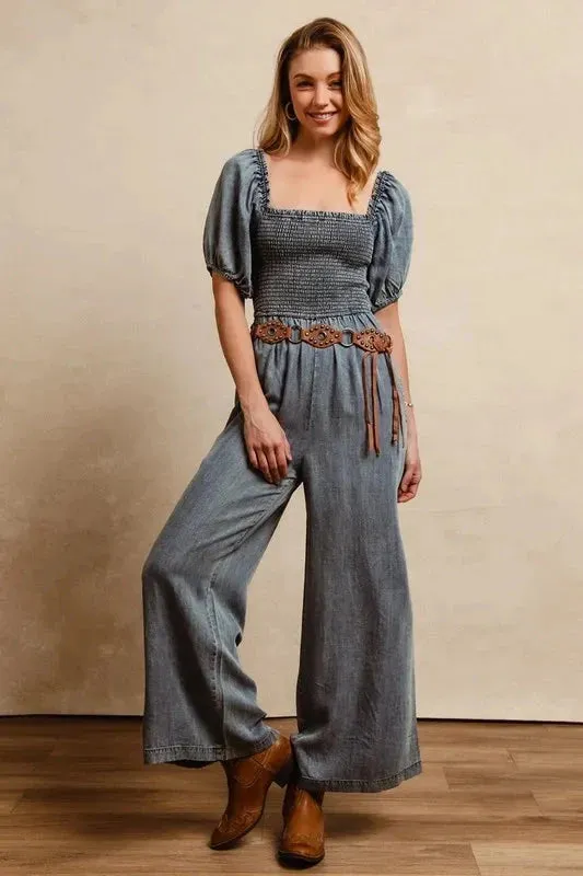 BiBi Smocked Washed Puff Sleeve Square Neck Denim Jumpsuit sold by Unique Kulture