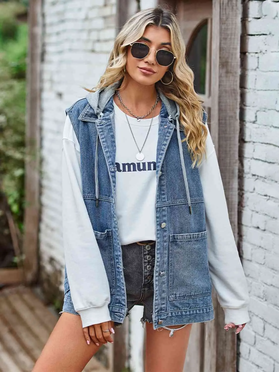 Button Up Sleeveless Denim Jacket with Pockets sold by Unique Kulture