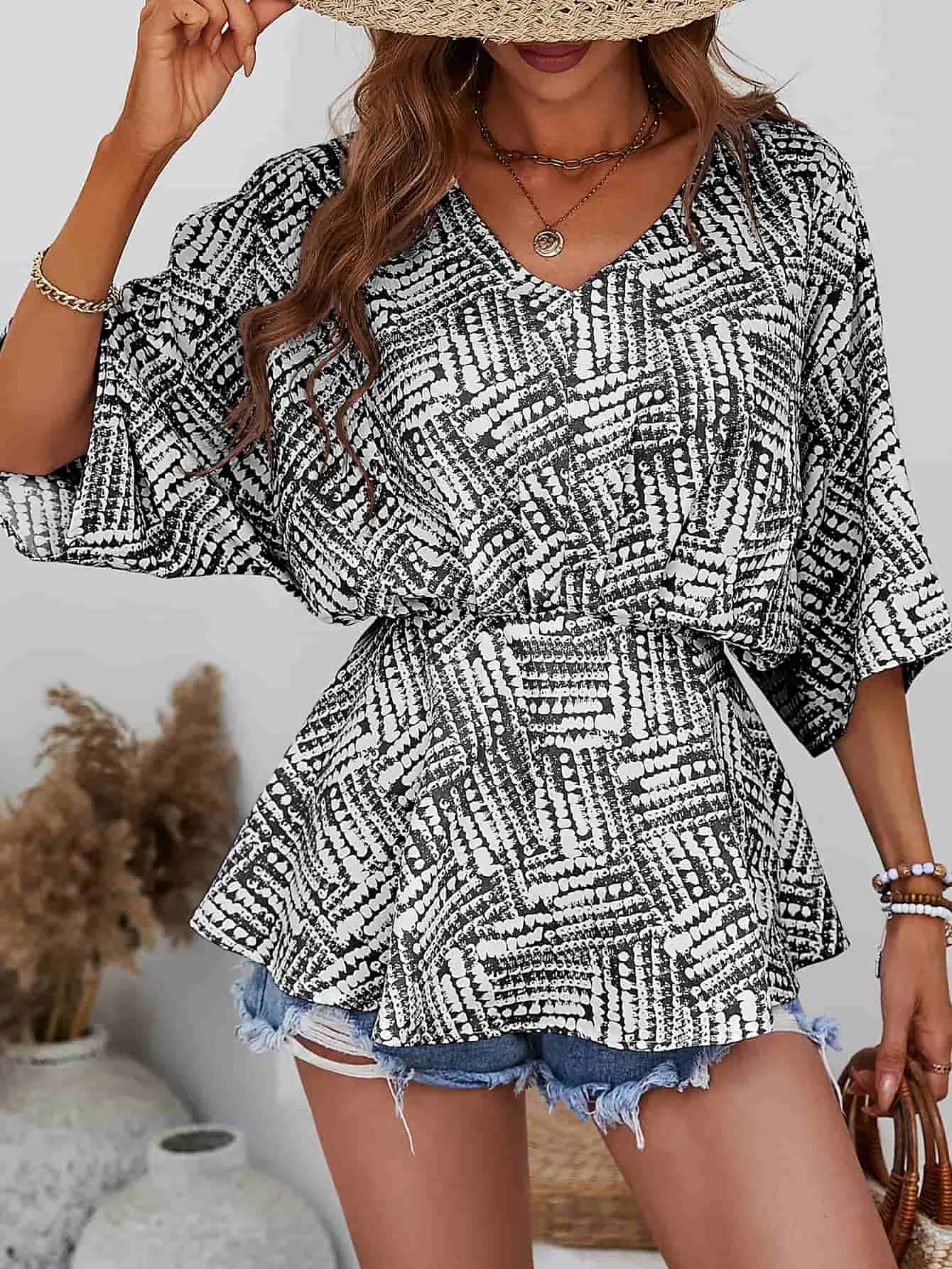 Printed V-Neck Dolman Sleeve Blouse sold by Unique Kulture