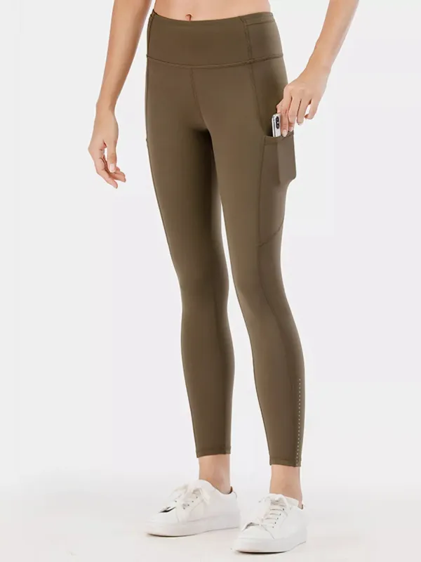 Full Size High-Waisted Active Leggings with Pockets Plus Size sold by Unique Kulture