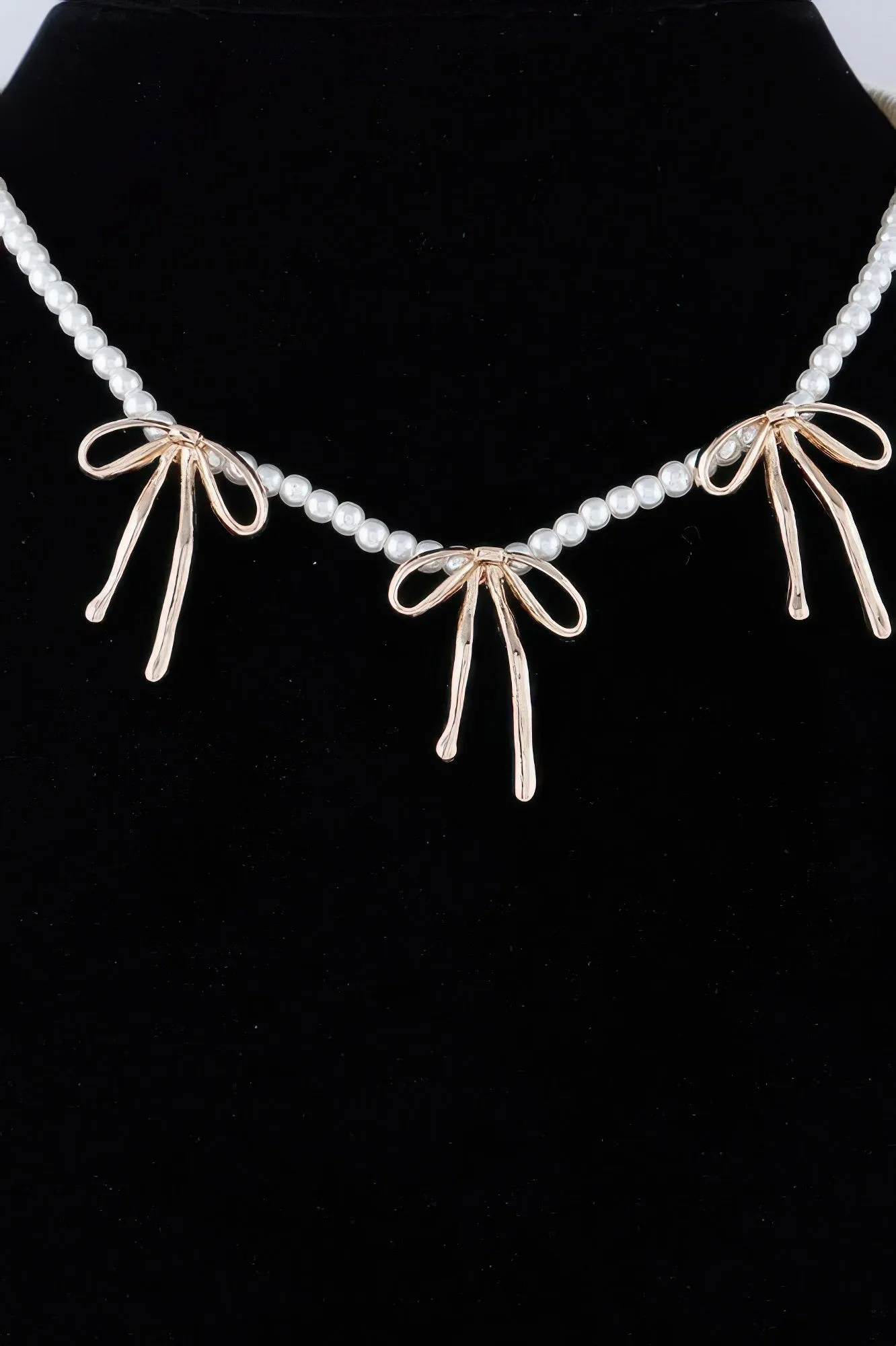 Pearl And Metal Ribbon Charm Necklace sold by Unique Kulture product image thumbnail 2