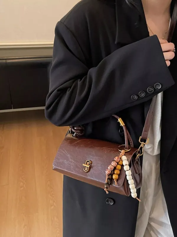 Leather Crossbody Bag with Bead Charm sold by Unique Kulture