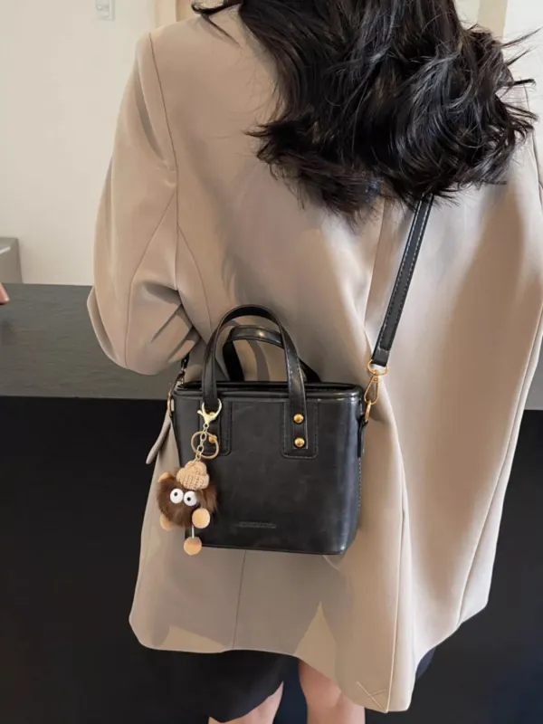 Leather Crossbody Bag with Charm sold by Unique Kulture