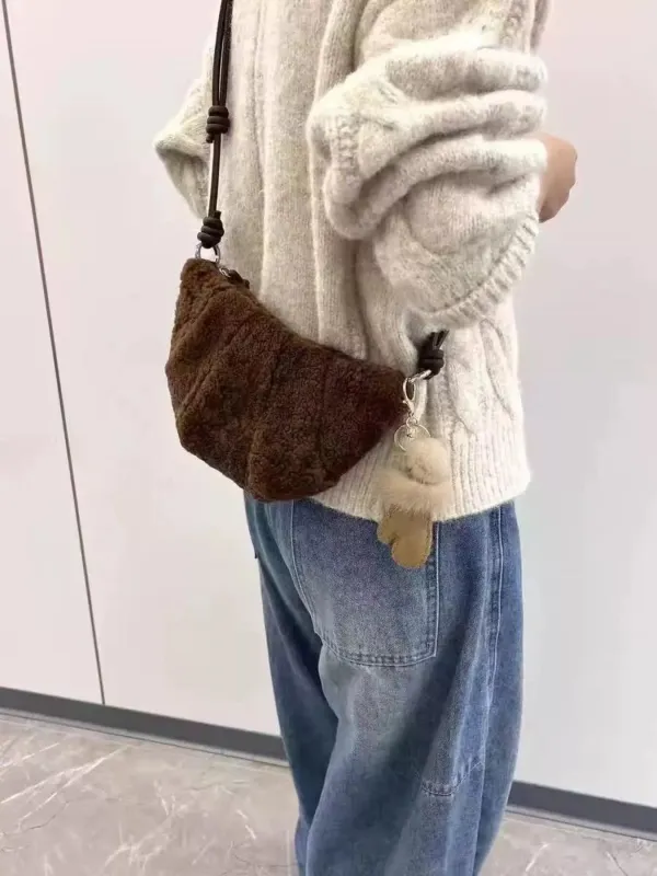 Knot Strap Furry Crossbody Bag sold by Unique Kulture