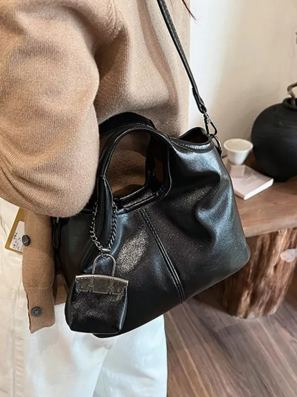 Leather Crossbody Bag with Charm sold by Unique Kulture