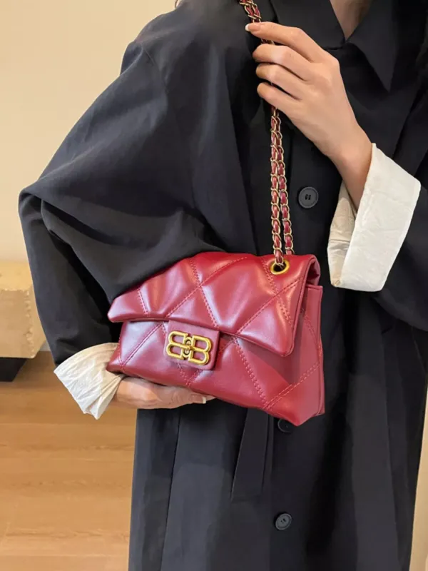 Quilted Flap Chain Crossbody Bag sold by Unique Kulture