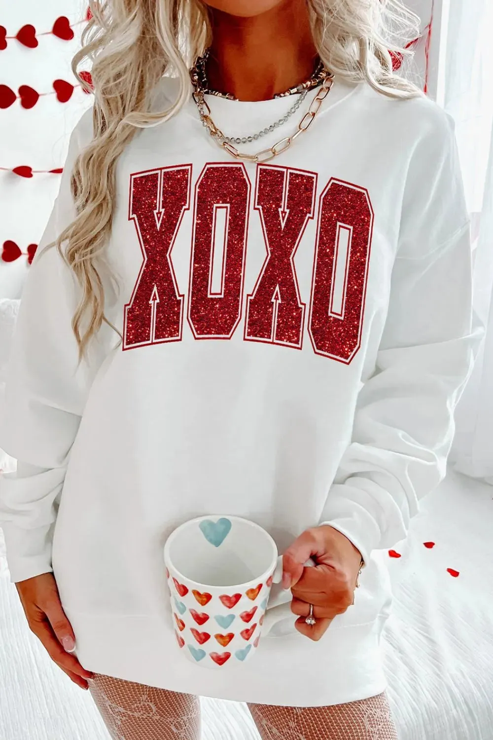Valentine’s Day XOXO Glitter Round Neck Sweatshirt sold by Unique Kulture