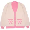 Bow Cardigan sold by Steady Hands