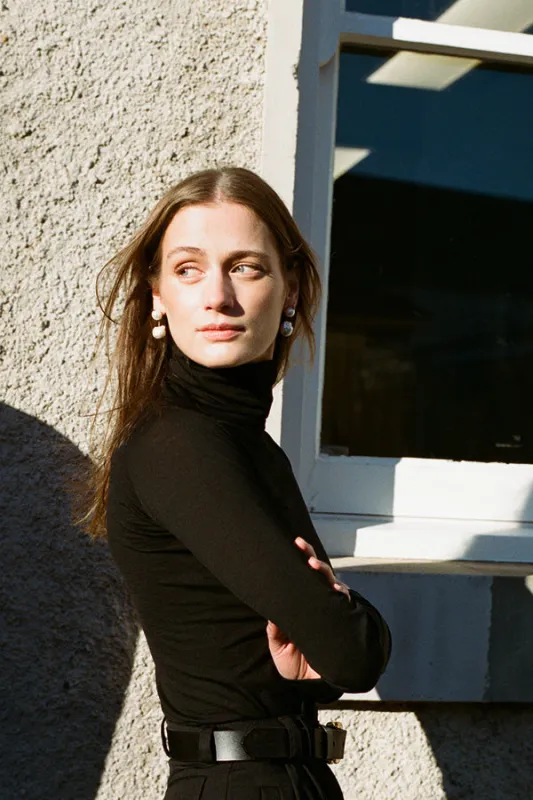 Georgia Australian Black Wool Skivvy sold by Caves Collect