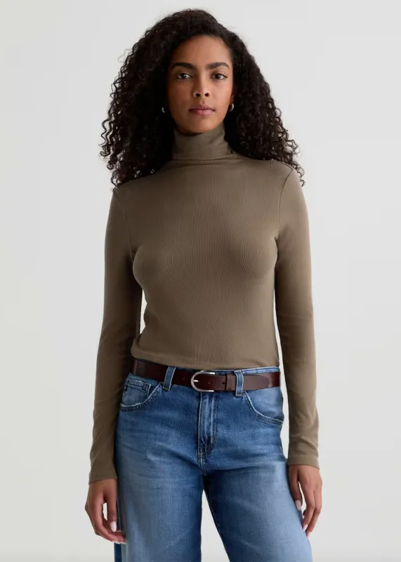 Chels Turtleneck sold by Denali