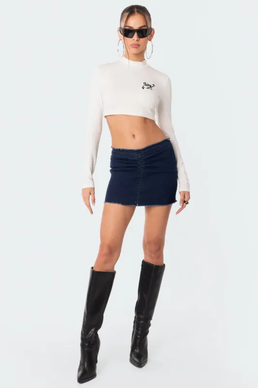 V Cut Low Rise Denim Mini Skirt sold by Edikted