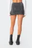 Trinity Studded Mini Skirt sold by Edikted