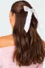 Ruffle Trim Bow Hair Clip sold by Edikted