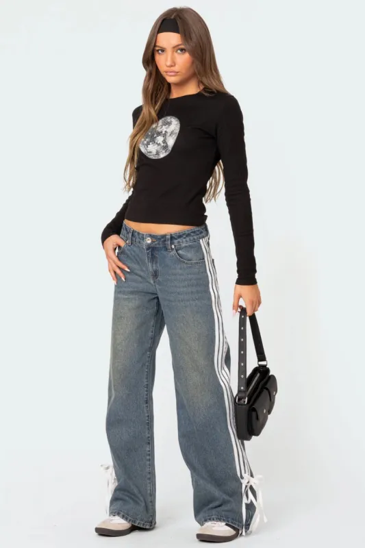 Ribbon Washed Low Rise Baggy Jeans sold by Edikted