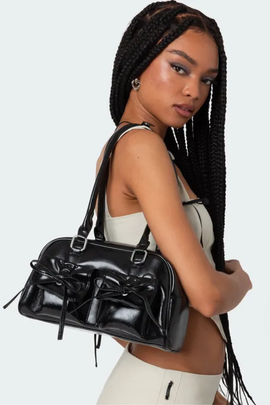 Bow Pocket Faux Leather Shoulder Bag sold by Edikted