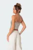 Mabel Metallic Faux Leather Corset sold by Edikted