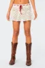 Jaslene Crochet Mini Skirt sold by Edikted