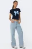 Washed Low Rise Ribbon Jeans sold by Edikted