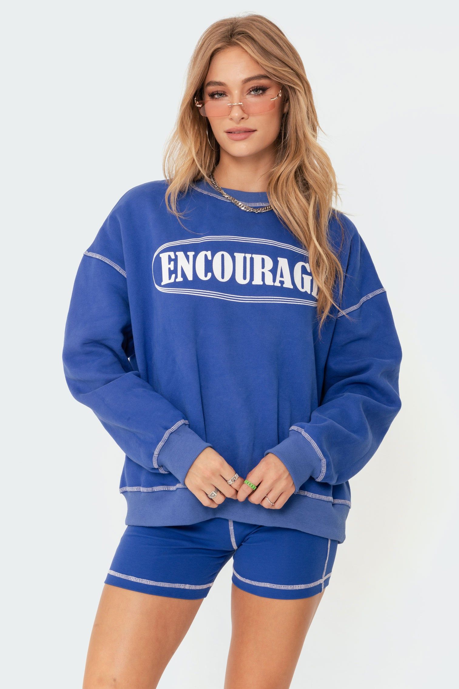Encourage Sweatshirt sold by Edikted