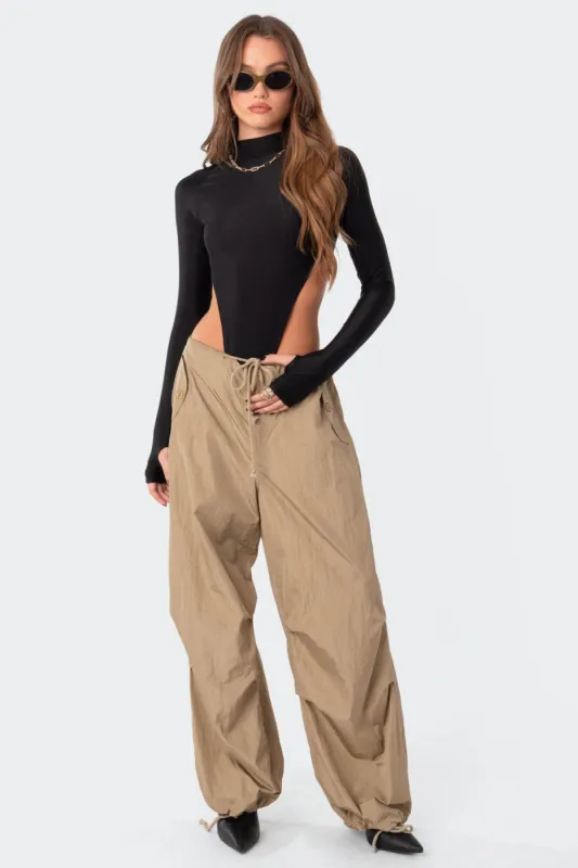 Nina High Cut Bodysuit sold by Edikted