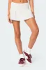 Camellia Cotton Scrunch Mini Skirt sold by Edikted