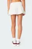 Camellia Cotton Scrunch Mini Skirt sold by Edikted