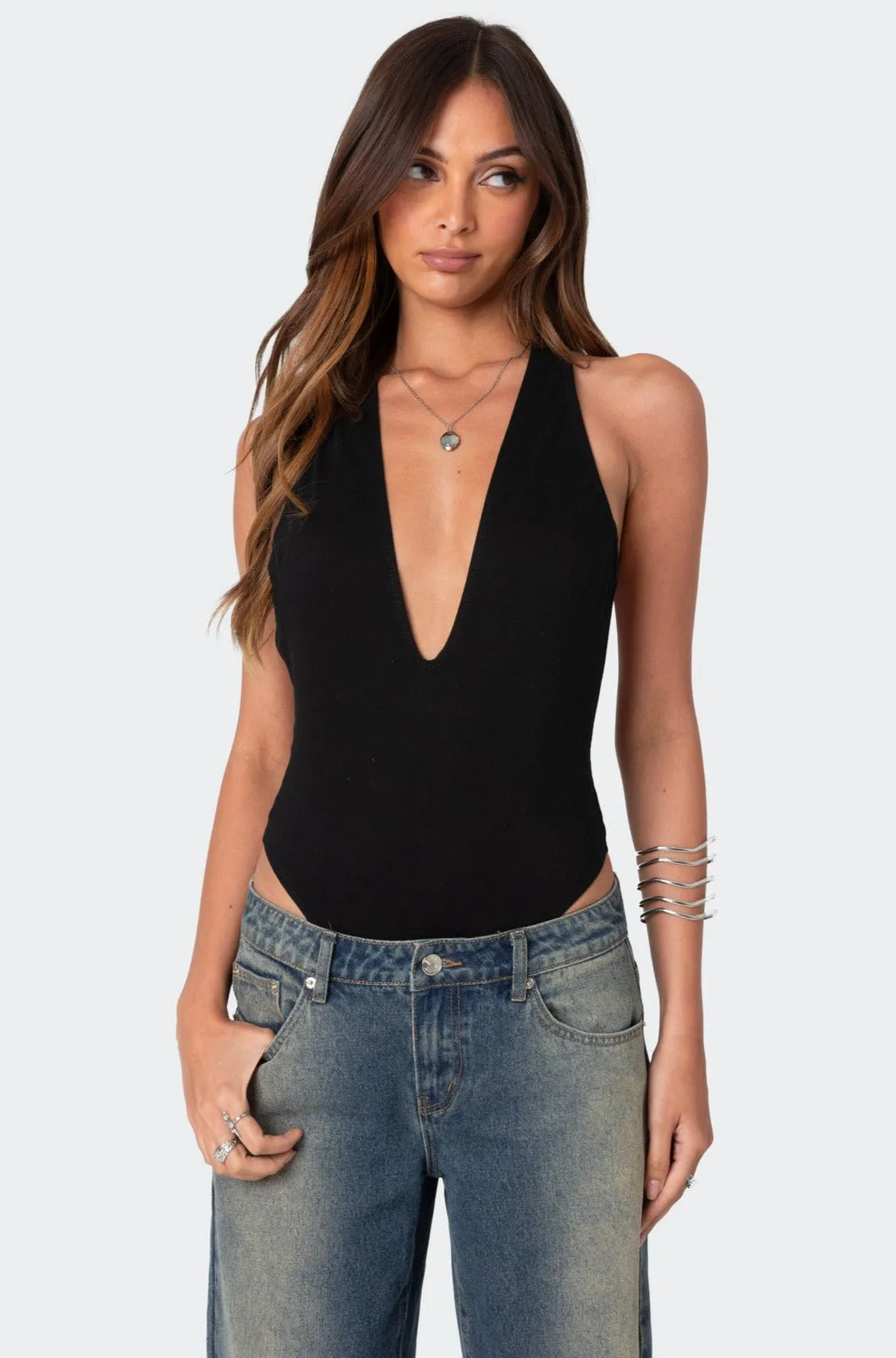 Deep V Backless Bodysuit sold by Edikted