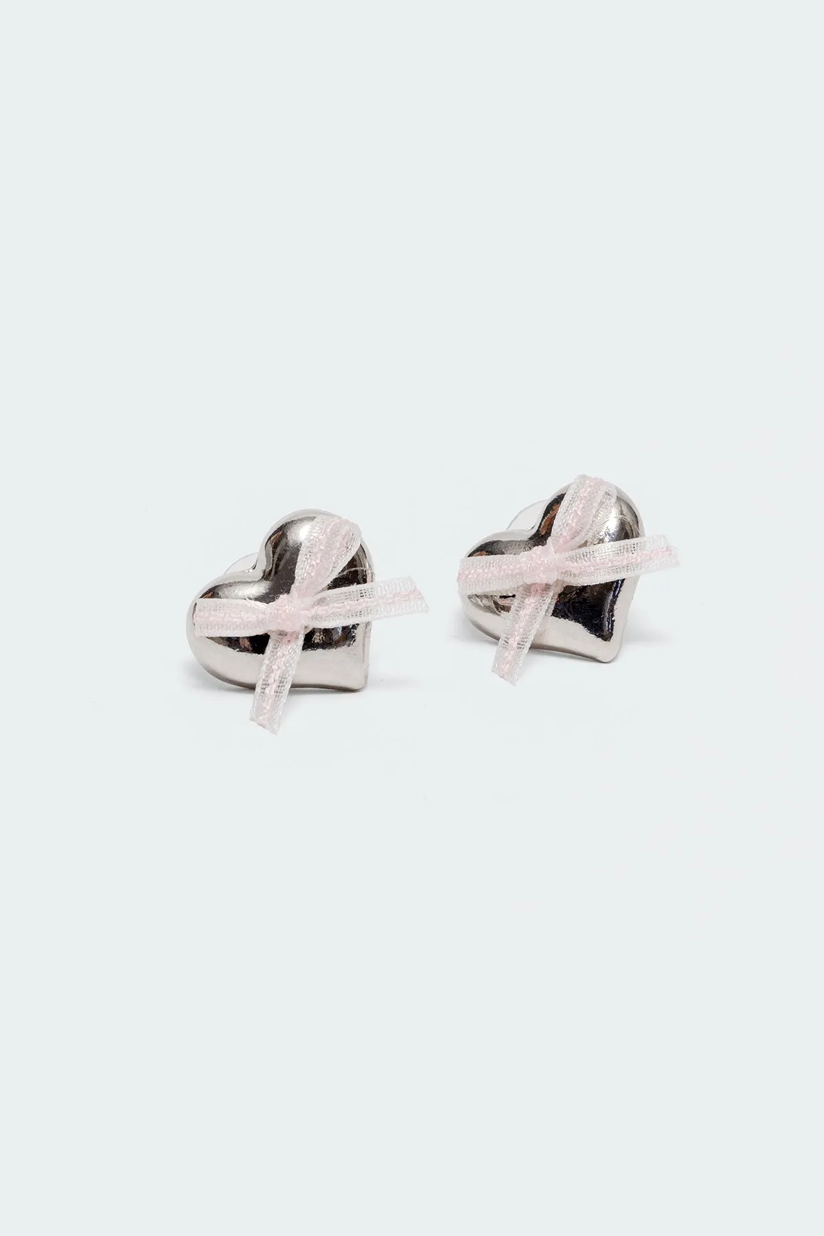 Heart & Bow Stud Earrings sold by Edikted product image thumbnail 2