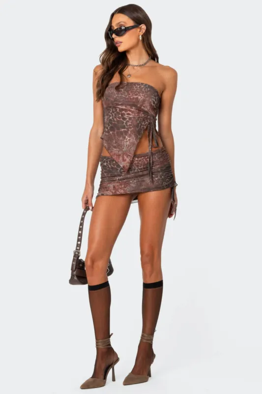 Leopard printed mesh mini skirt sold by Edikted