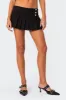 Khai Pleated Mini Skort sold by Edikted
