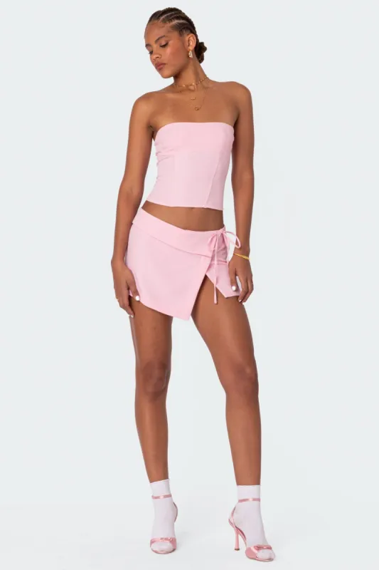 Selena Asymmetric Wrap Mini Skirt sold by Edikted