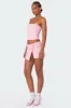 Selena Asymmetric Wrap Mini Skirt sold by Edikted