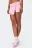 Selena Asymmetric Wrap Mini Skirt sold by Edikted