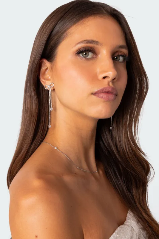 Rhinestone Dangling Bow Earrings sold by Edikted